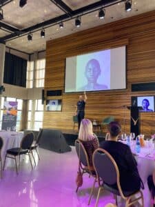 Breakfast Event Johannesburg 2025 - 2 800 S Coach Axel Rittershaus speaking on a stage at an event